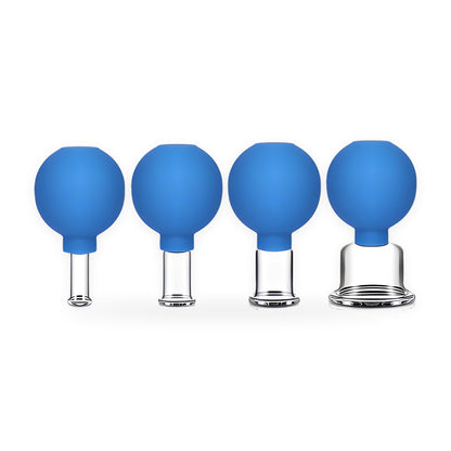 Glass face cupping set on a white background