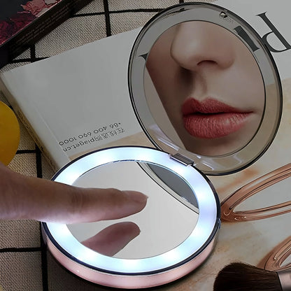 LED compact mirror lit up in use