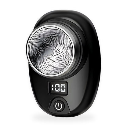 Mini electric shaver on a white background