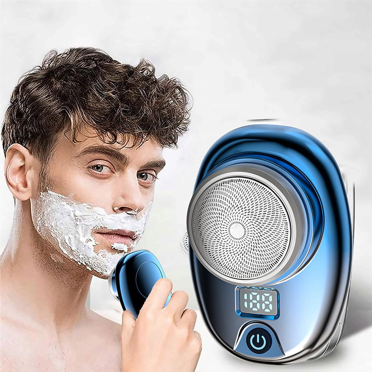 Man using the mini electric shaver
